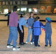 family skating together