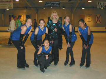 Group shot of skaters in costumes