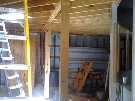 open frames inside the pro shop under construction
